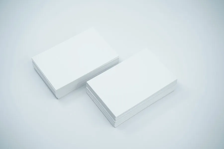Two stacks of blank business cards