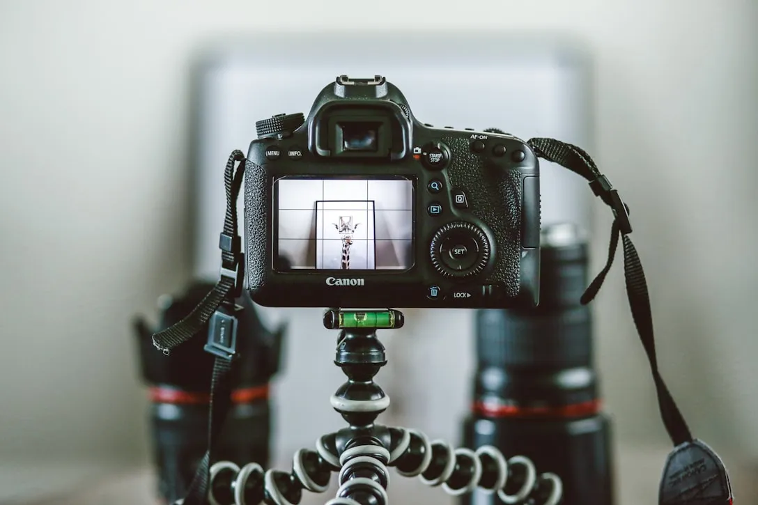 A camera on a tripod set up for a shoot